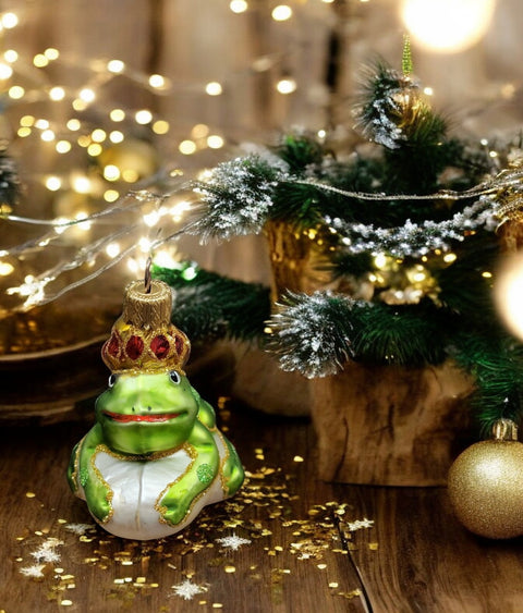 Glass frog with a crown ornament