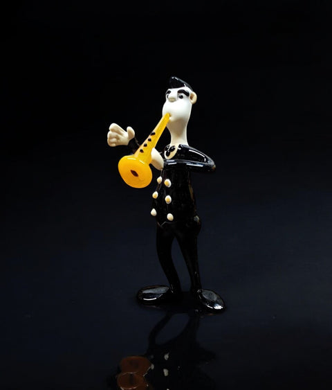 Glass musician with clarinet figurine