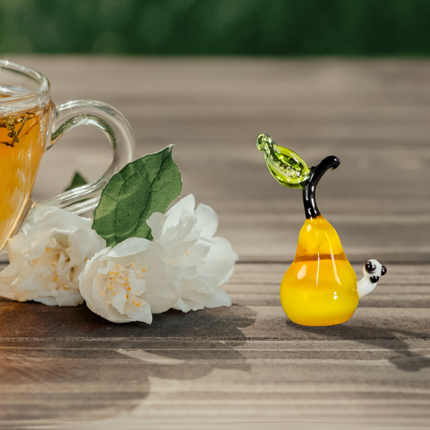 Glass pear with worm mini figurine