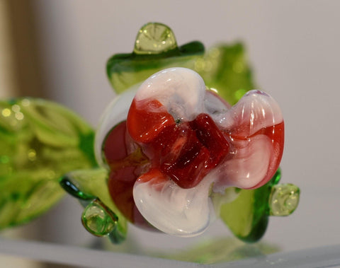 Red and white glass rose