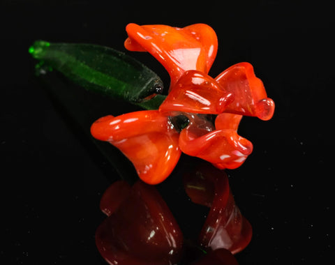 a close up of a flower shaped object on a table